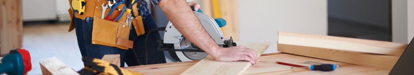 Carpenter working in a house